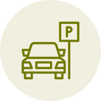 Car parked beside a parking sign.