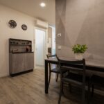 Modern dining room with wooden floor.